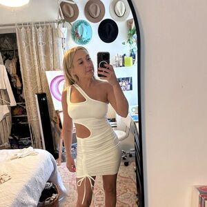 Single shoulder white dress with cutouts